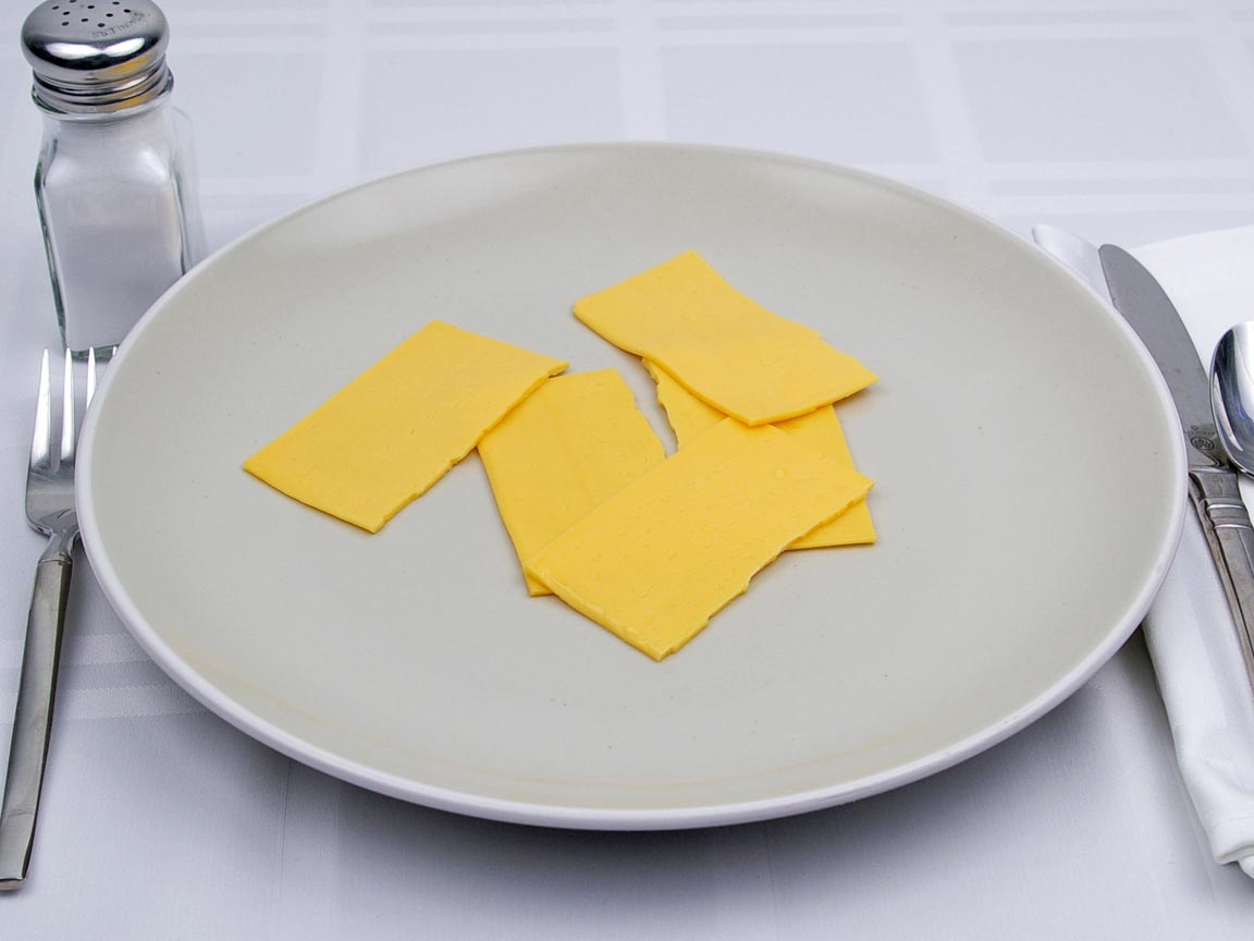 Calories in 2.5 slice of American Cheese - Fat Free Singles