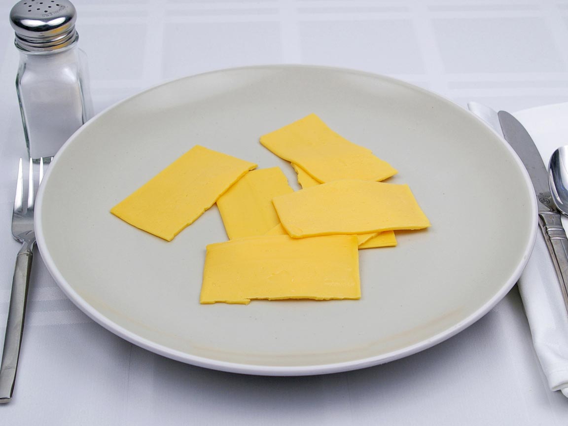 Calories in 3.5 slice of American Cheese - Fat Free Singles