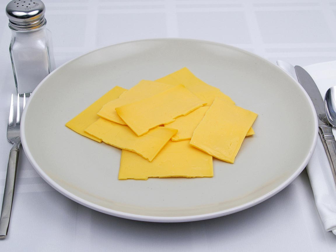 Calories in 5.5 slice of American Cheese - Fat Free Singles