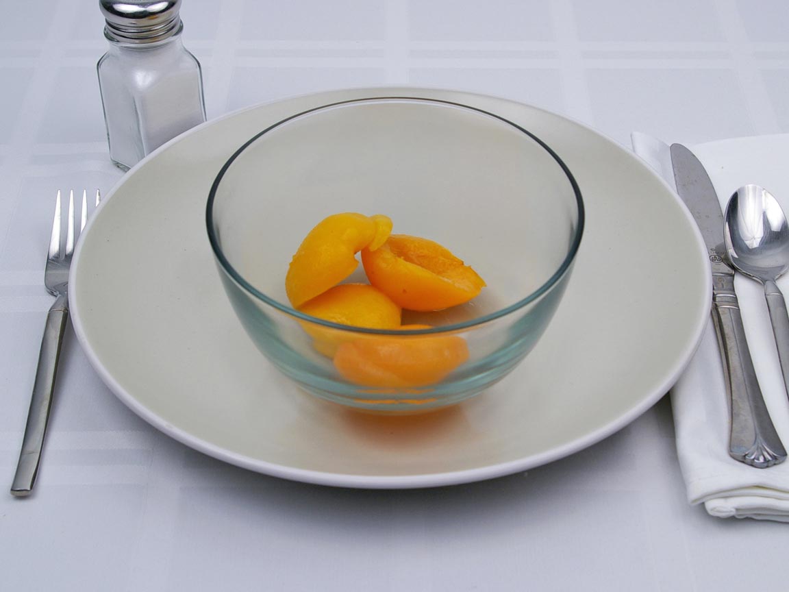 Calories in 0.66 cup(s) of Apricots in Heavy Syrup