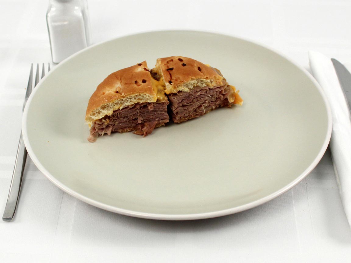 Calories in 0.5 sandwich(s) of Arby's Beef'n Cheddar Medium
