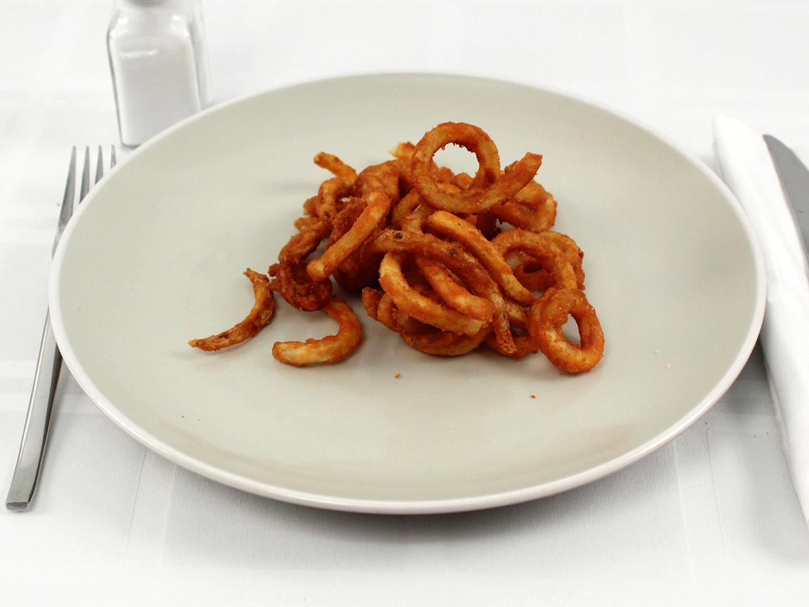 Calories in 85 grams of Arby's Curly Fries