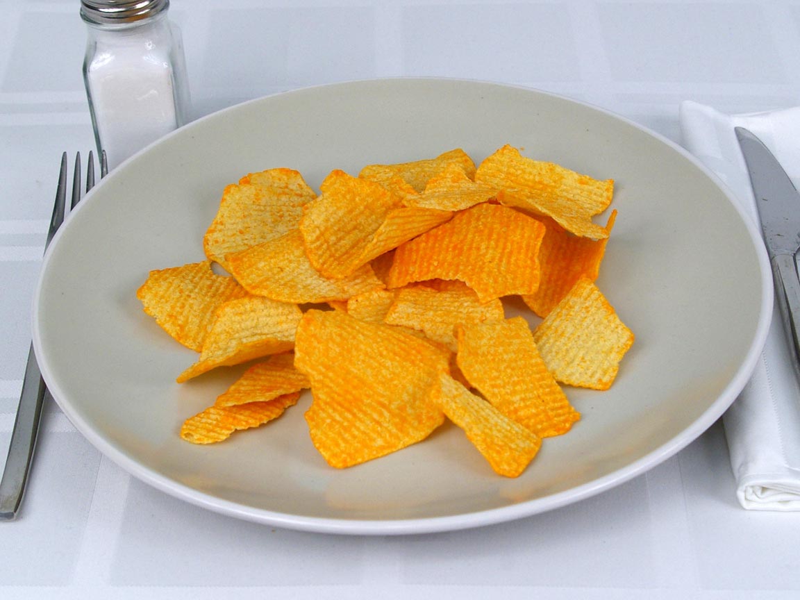 Calories in 42 grams of Ruffles Baked Cheddar and Sour Cream Chips
