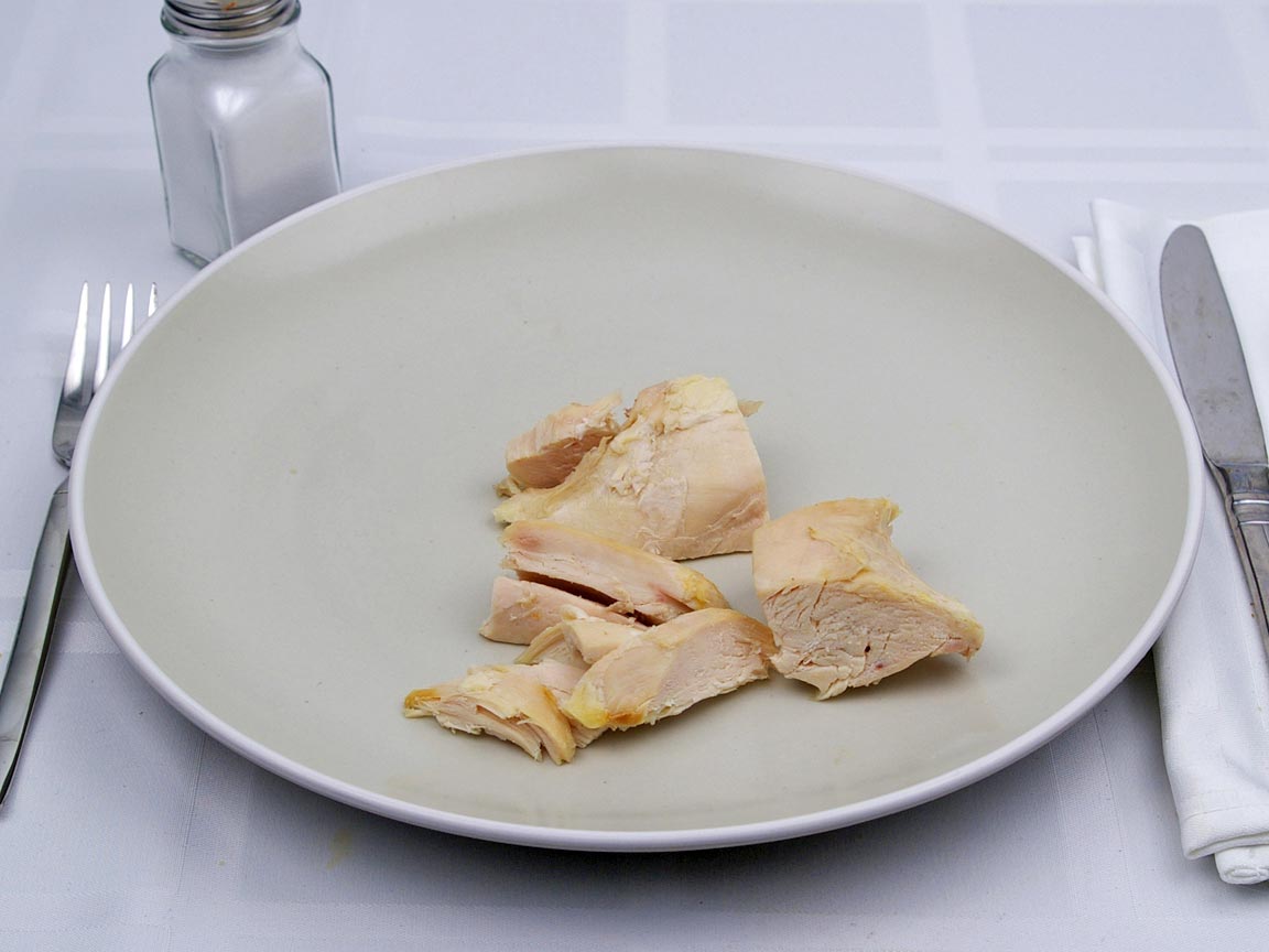 Calories in 0.5 breast of Chicken - Baked - Breast - Skinless