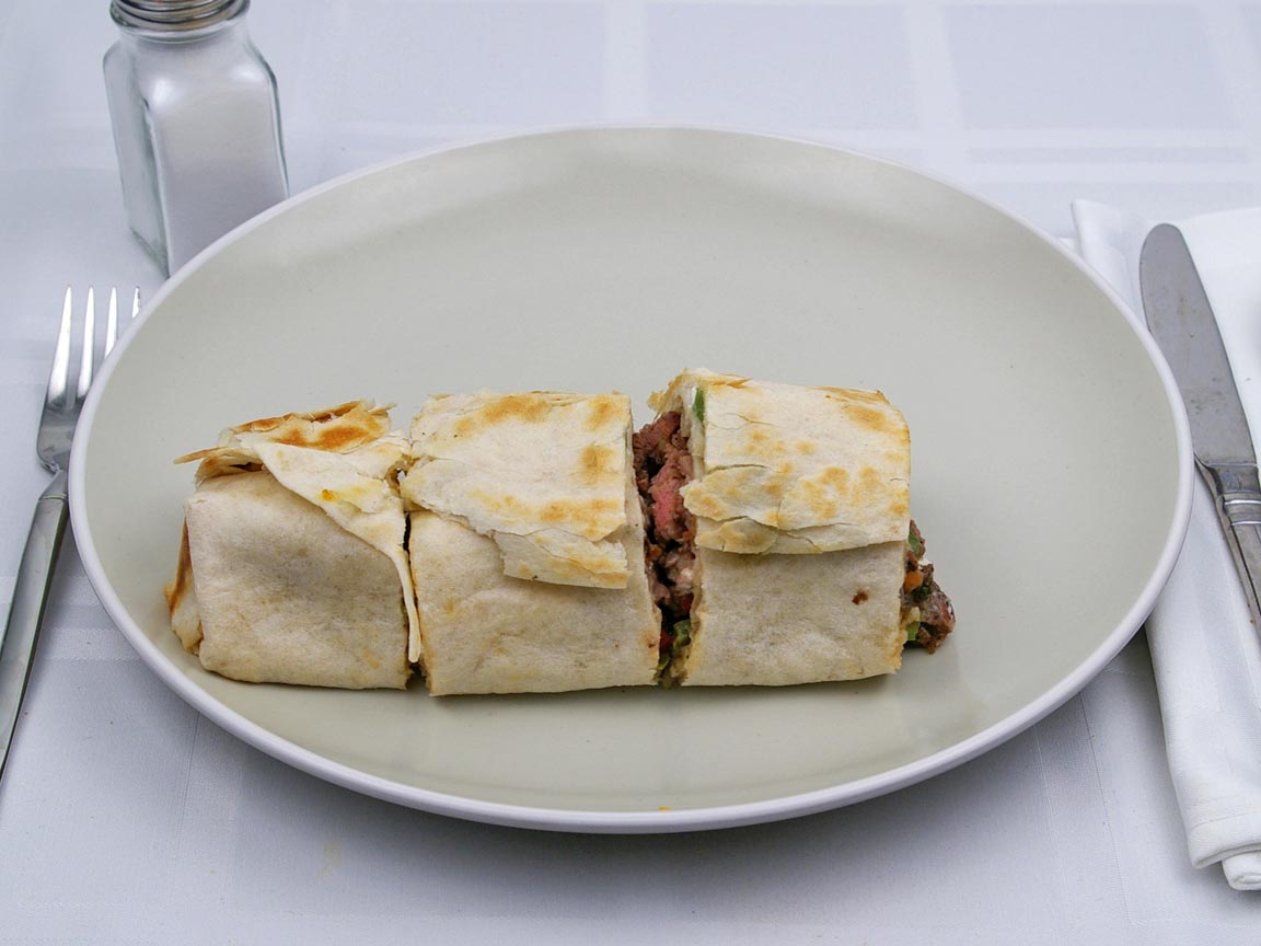 Calories in 0.75 burrito(s) of Baja Fresh - Ultimo Steak Burrito