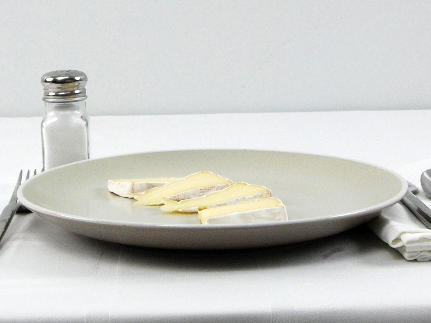 Calories in 56 grams of Camembert Cheese