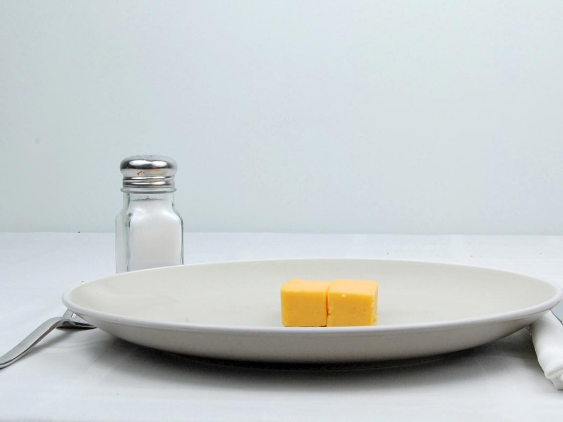 Calories in 56 grams of Cheddar Cheese - Cubed