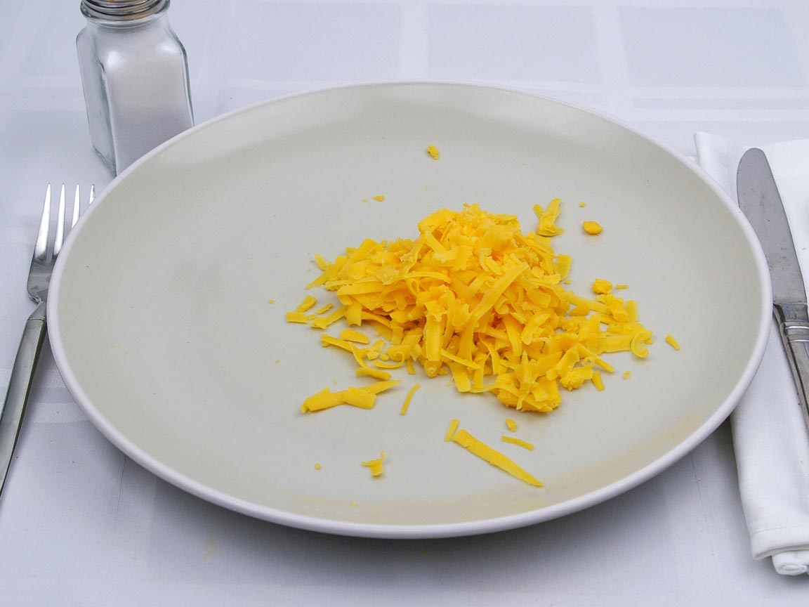 Calories in 0.5 cup(s) of Cheddar Cheese - Shredded
