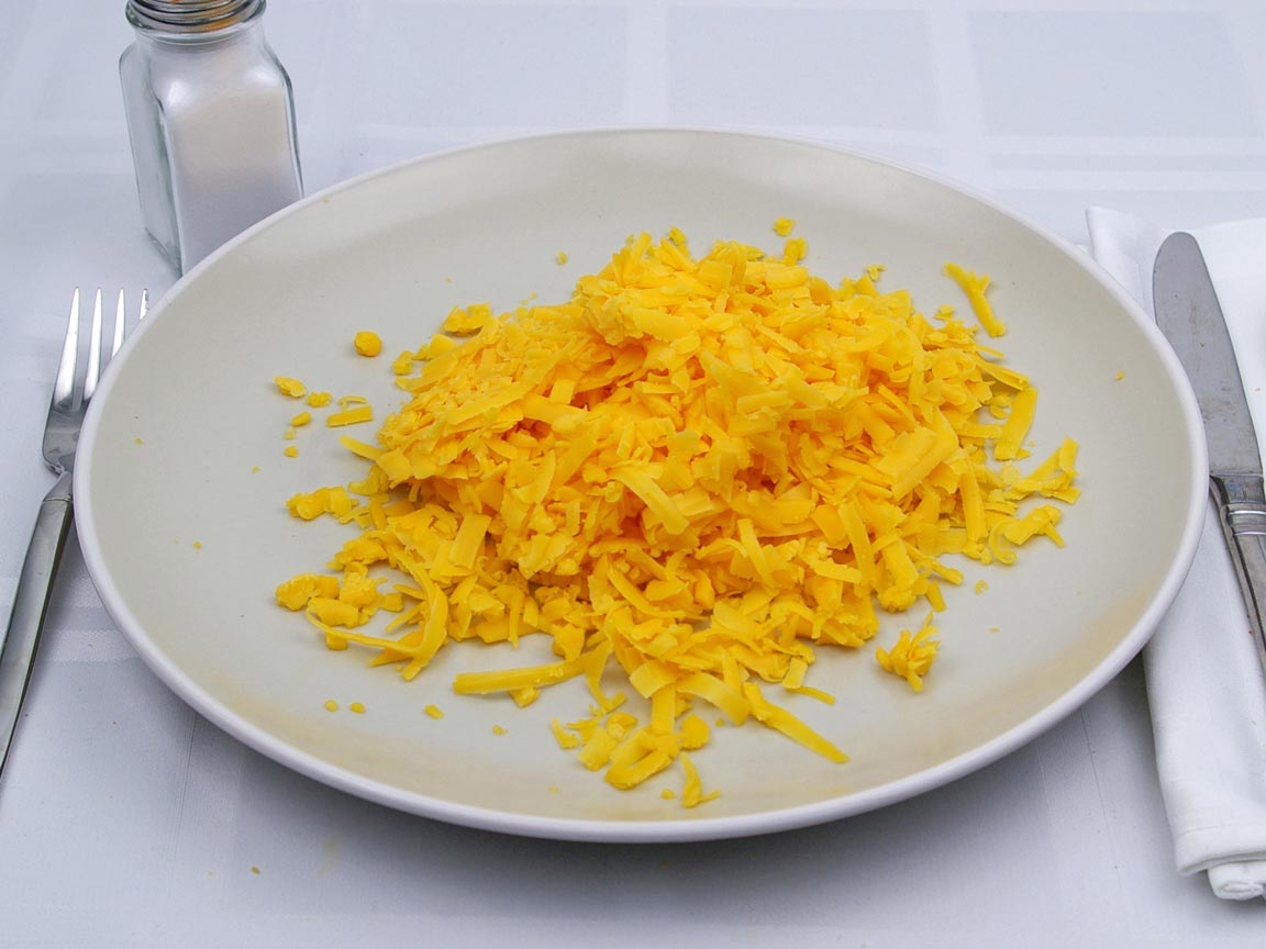 Calories in 2 cup(s) of Cheddar Cheese - Shredded