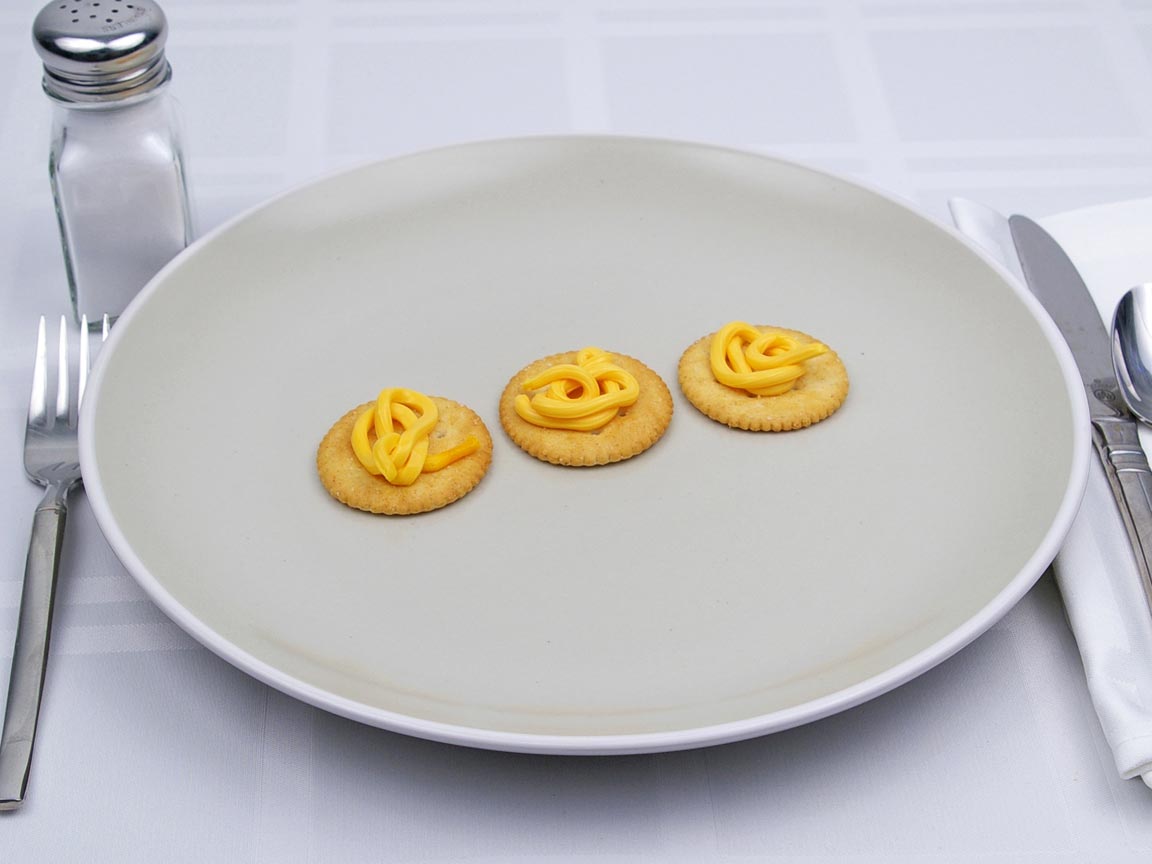 Calories in 3 tsp(s) of Easy Cheese - Shown on Cracker
