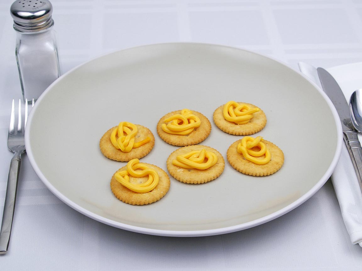 Calories in 6 tsp(s) of Easy Cheese - Shown on Cracker