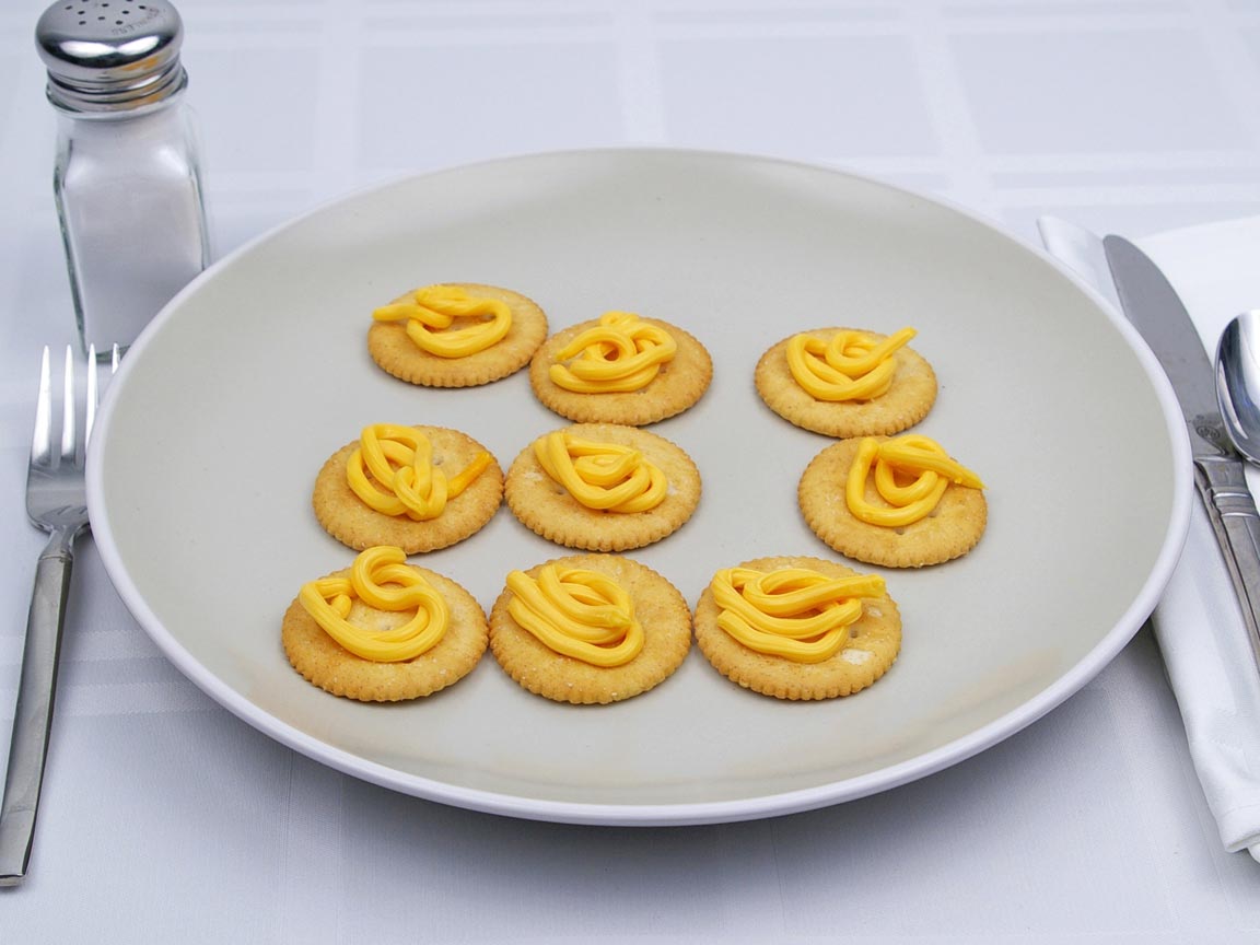 Calories in 9 tsp(s) of Easy Cheese - Shown on Cracker