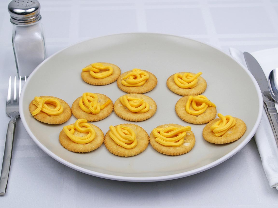 Calories in 11 tsp(s) of Easy Cheese - Shown on Cracker