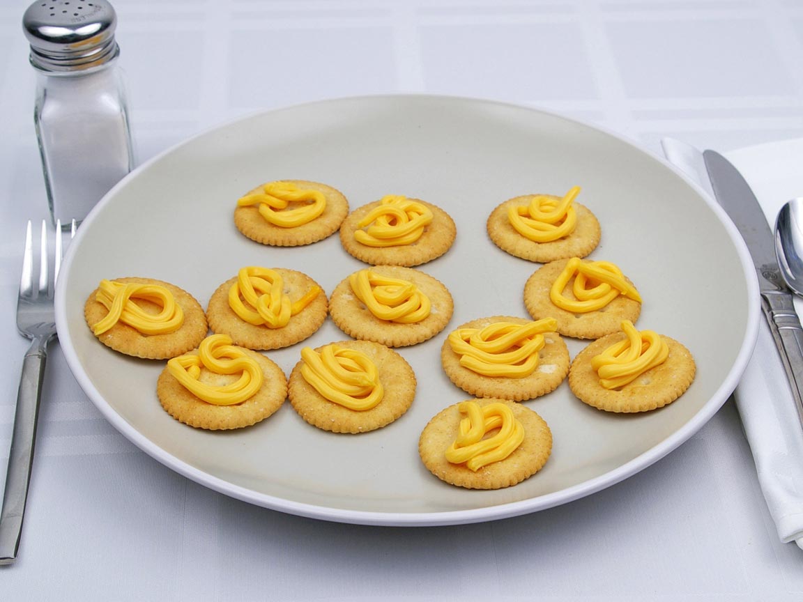 Calories in 12 tsp(s) of Easy Cheese - Shown on Cracker