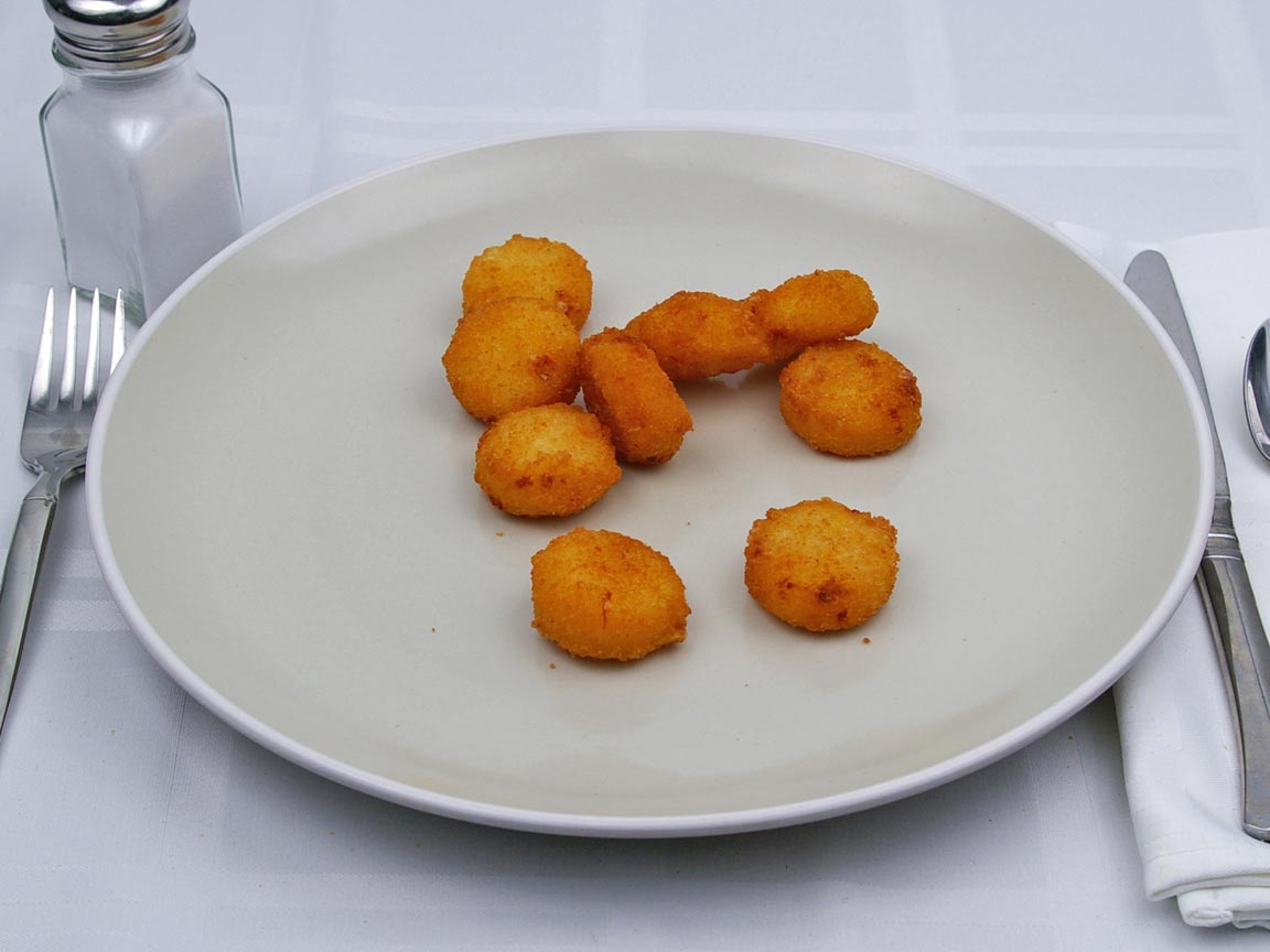 Calories in 9 tot(s) of Burger King - Cheesy Tots