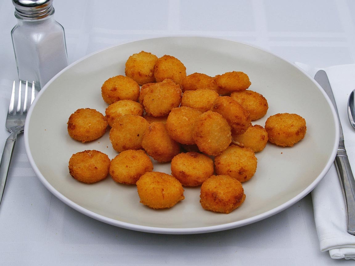 Calories in 27 tot(s) of Burger King - Cheesy Tots