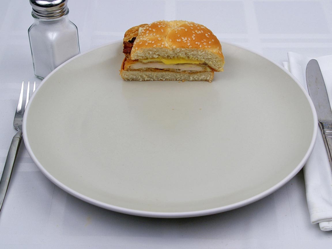 Calories in 0.5 sandwich(es) of Arby's  - Chicken Bacon Swiss Crispy