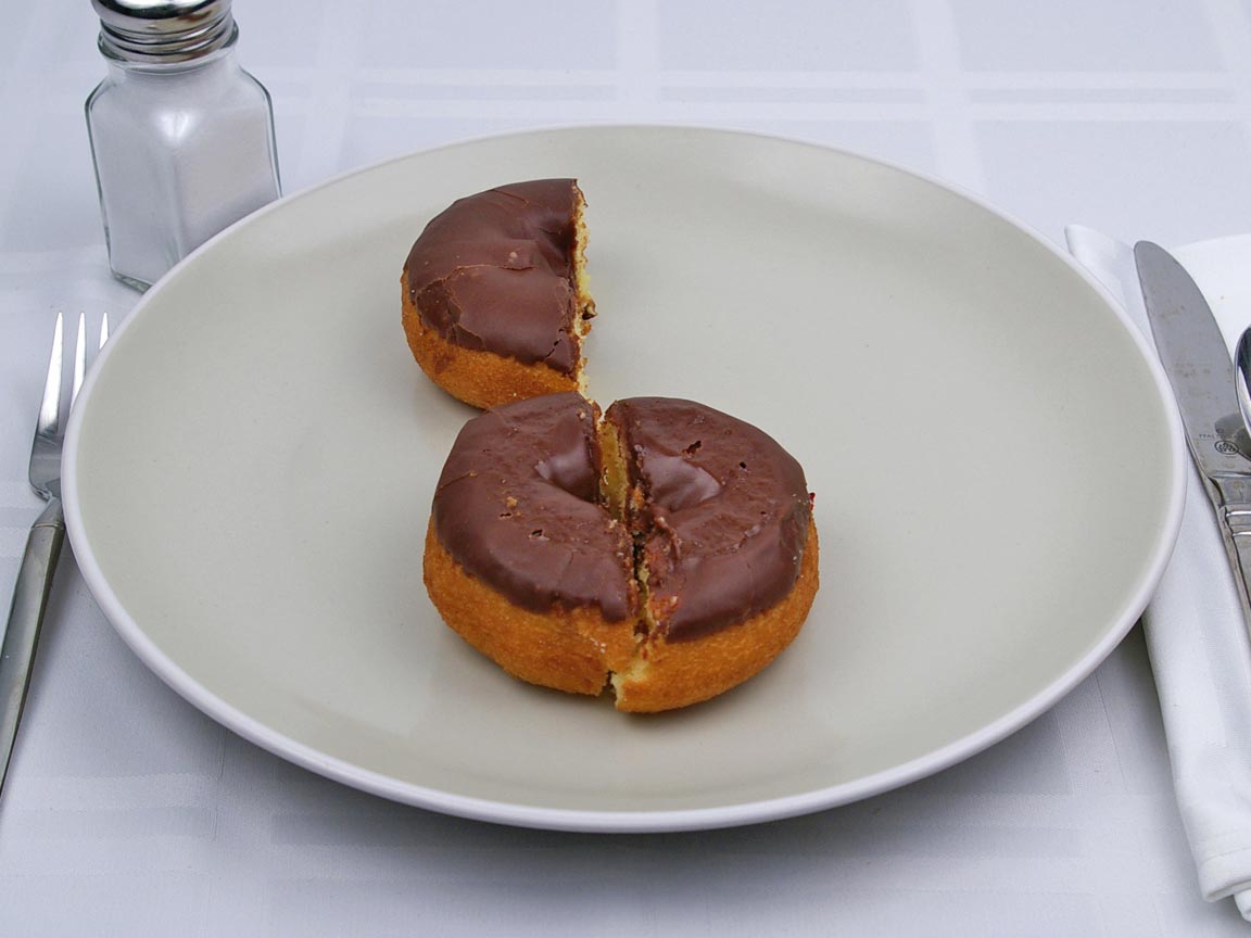 Calories in 1.5 donut(s) of Chocolate Iced Donut