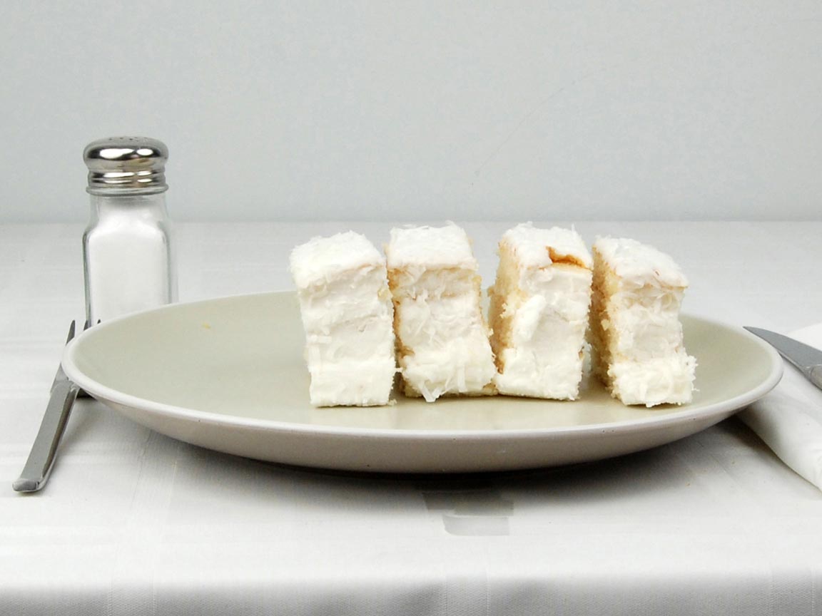 Calories in 4 piece(s) of Coconut Cake