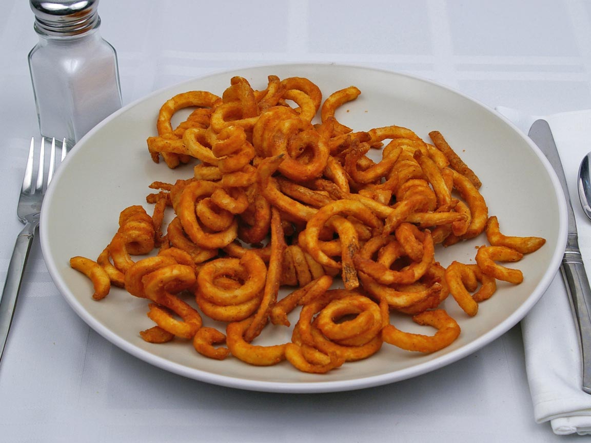 Calories in 1.5 large of Jack in the Box - Seasoned Curly Fries