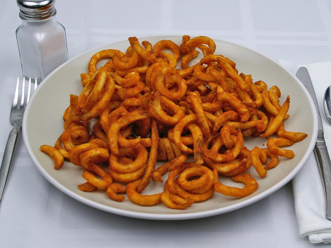 Calories in 2 large of Jack in the Box - Seasoned Curly Fries