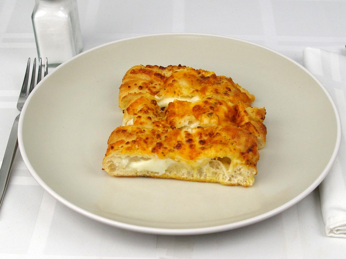 Calories in 3 piece(s) of Domino's Stuffed Cheesy Bread