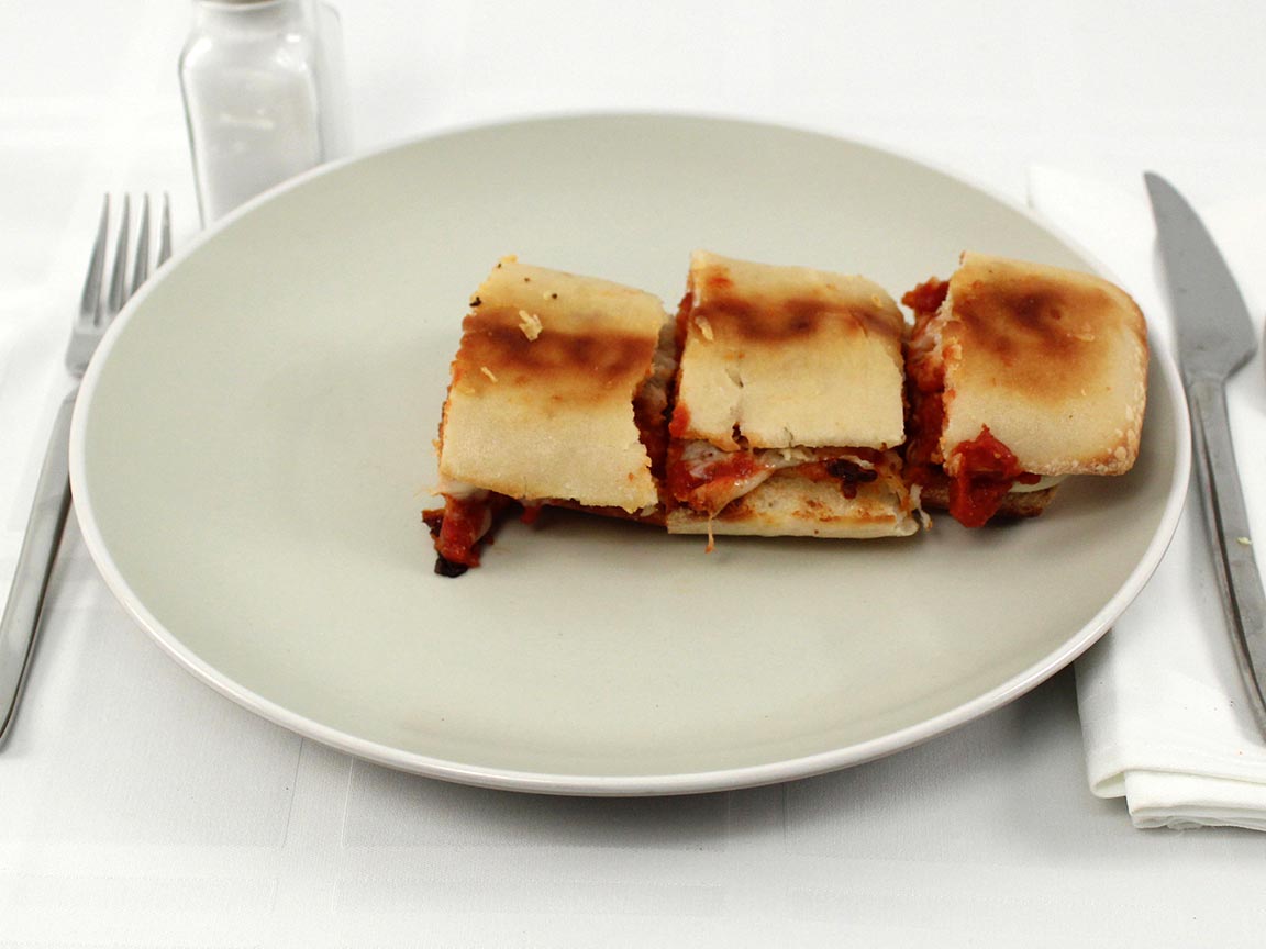 Calories in 0.75 sandwich(s) of Domino's Chicken Parm Sandwich