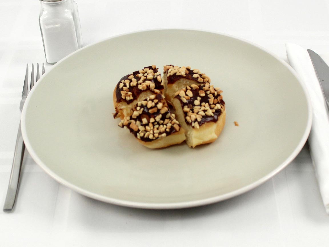 Calories in 1 donut(s) of Chocolate Glazed Peanut Donut