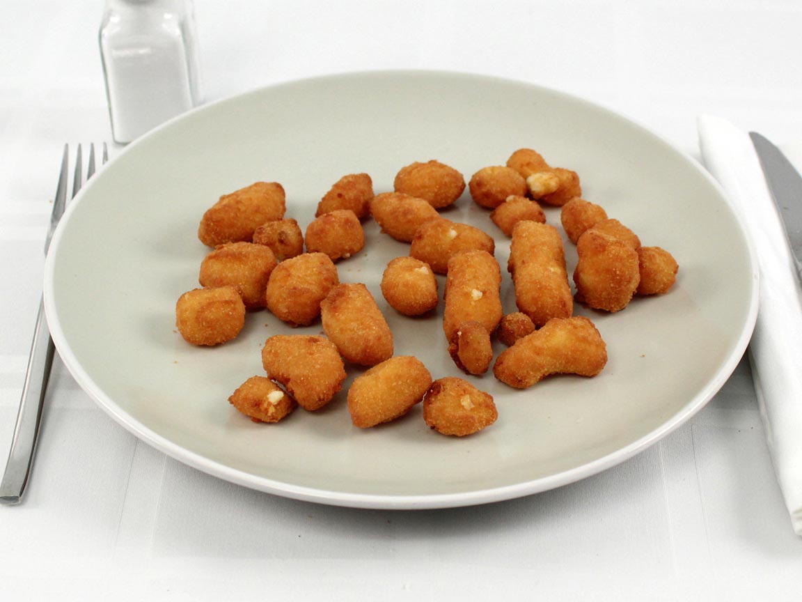 Calories in 1.2 small(s) of Dairy Queen Cheese Curds