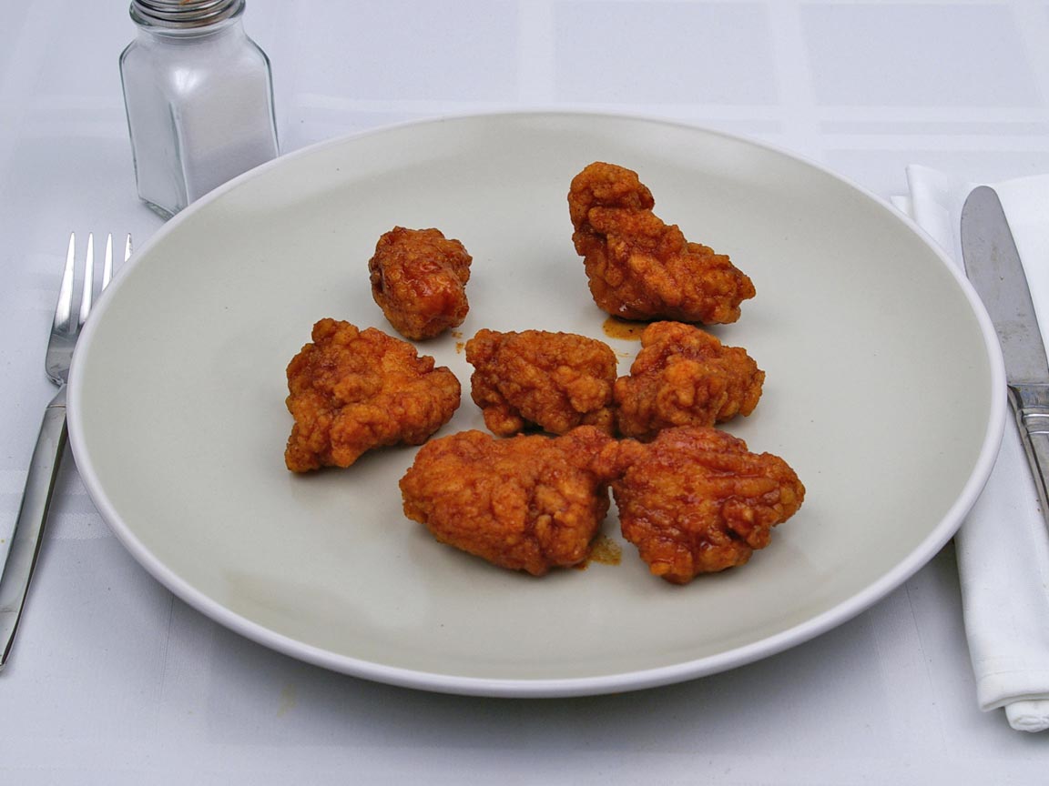 Calories in 7 piece(s) of Kentucky Fried Chicken - HBBQ Hot Wings