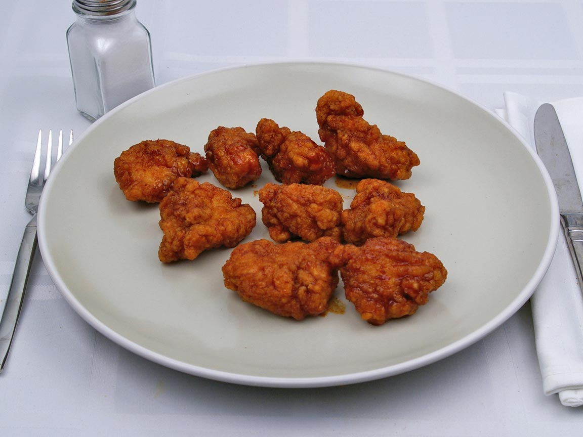 Calories in 9 piece(s) of Kentucky Fried Chicken - HBBQ Hot Wings