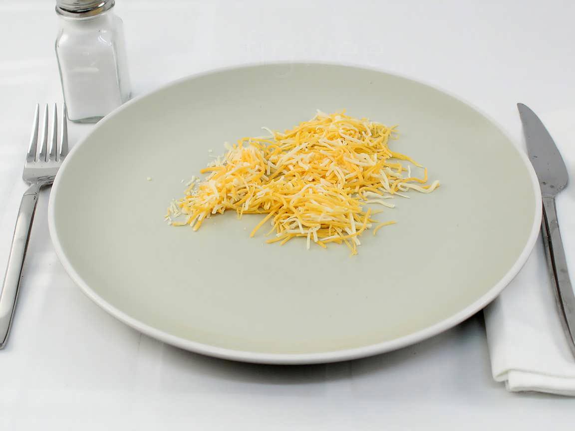 Calories in 20 grams of Shredded Cheddar Jack Cheese