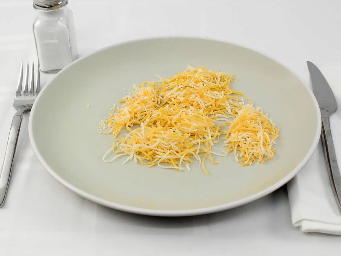 Calories in 30 grams of Shredded Cheddar Jack Cheese