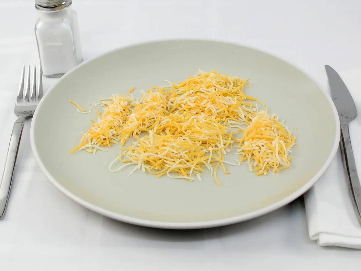 Calories in 35 grams of Shredded Cheddar Jack Cheese