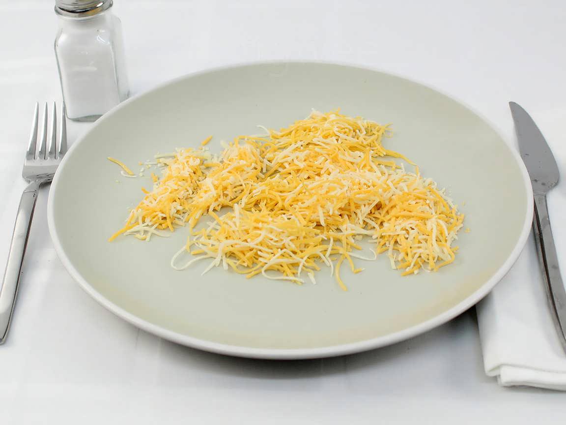 Calories in 40 grams of Shredded Cheddar Jack Cheese