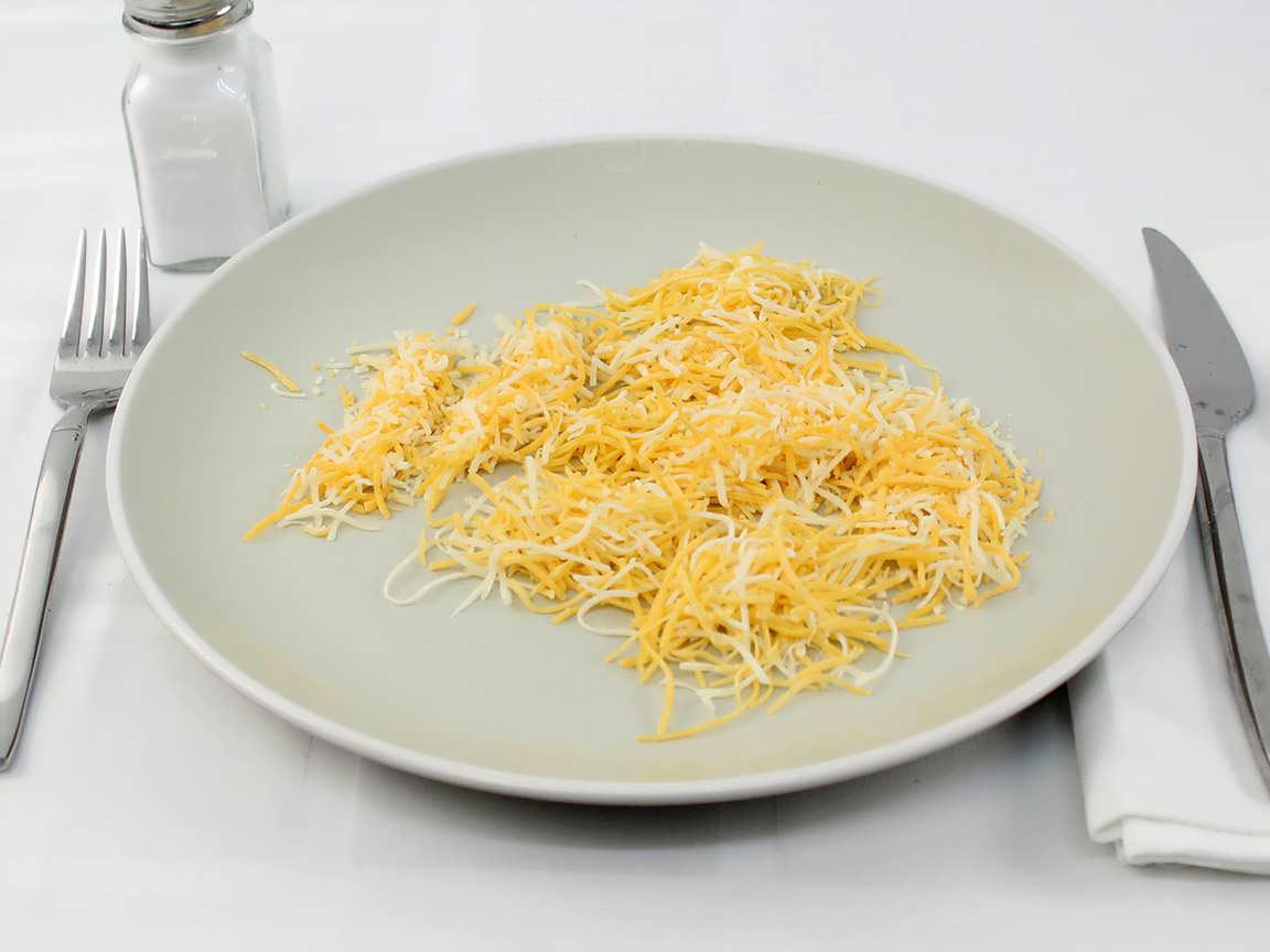 Calories in 45 grams of Shredded Cheddar Jack Cheese