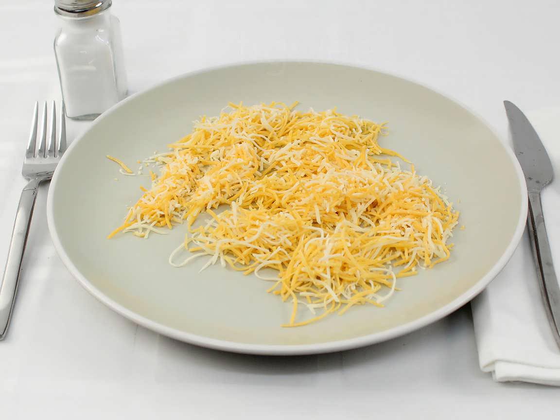 Calories in 50 grams of Shredded Cheddar Jack Cheese