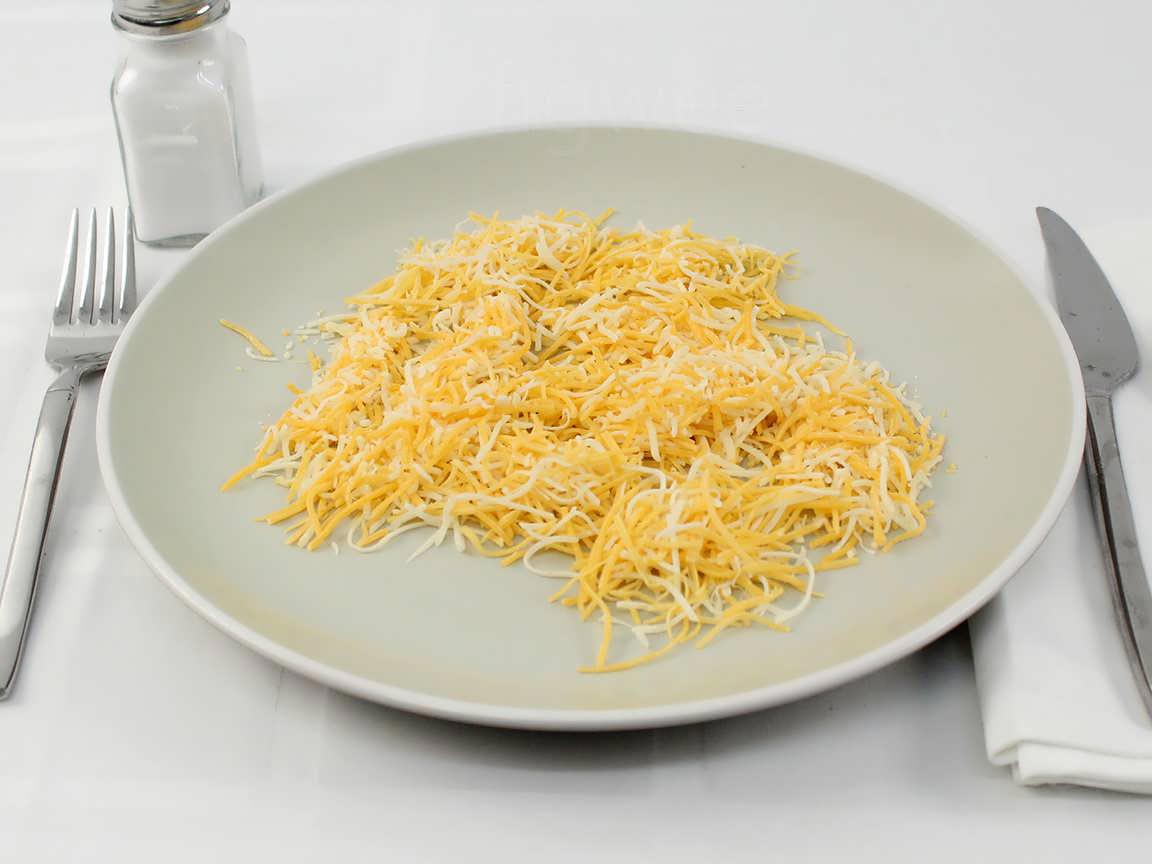 Calories in 55 grams of Shredded Cheddar Jack Cheese