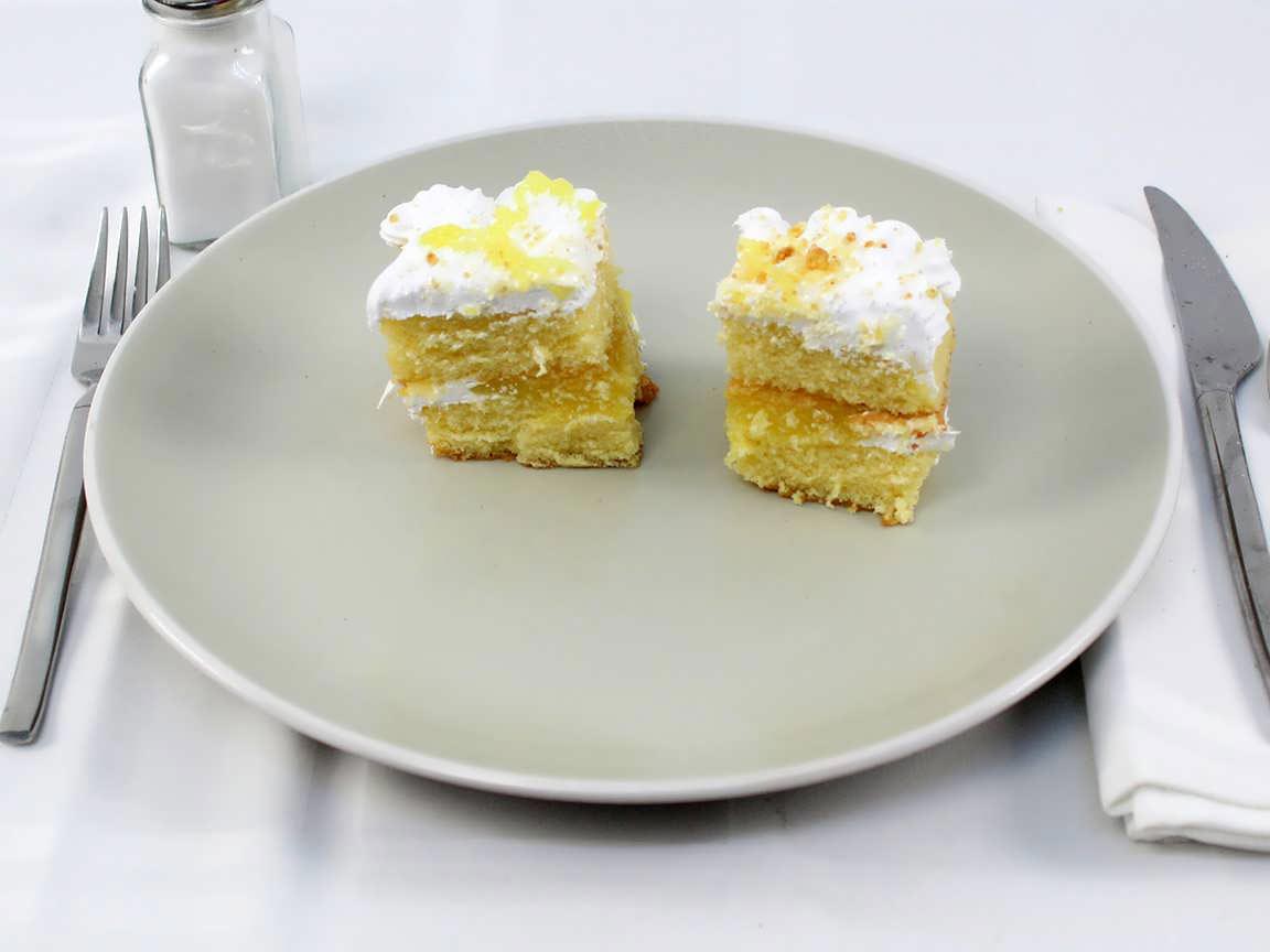 Calories in 0.5 piece(s) of Lemon Filled Yellow Cake