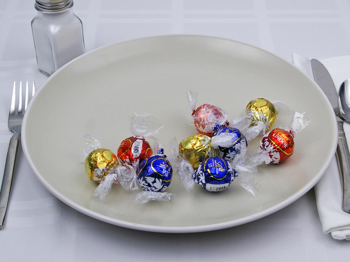 Calories in 9 piece(s) of Lindor Chocolate Truffles
