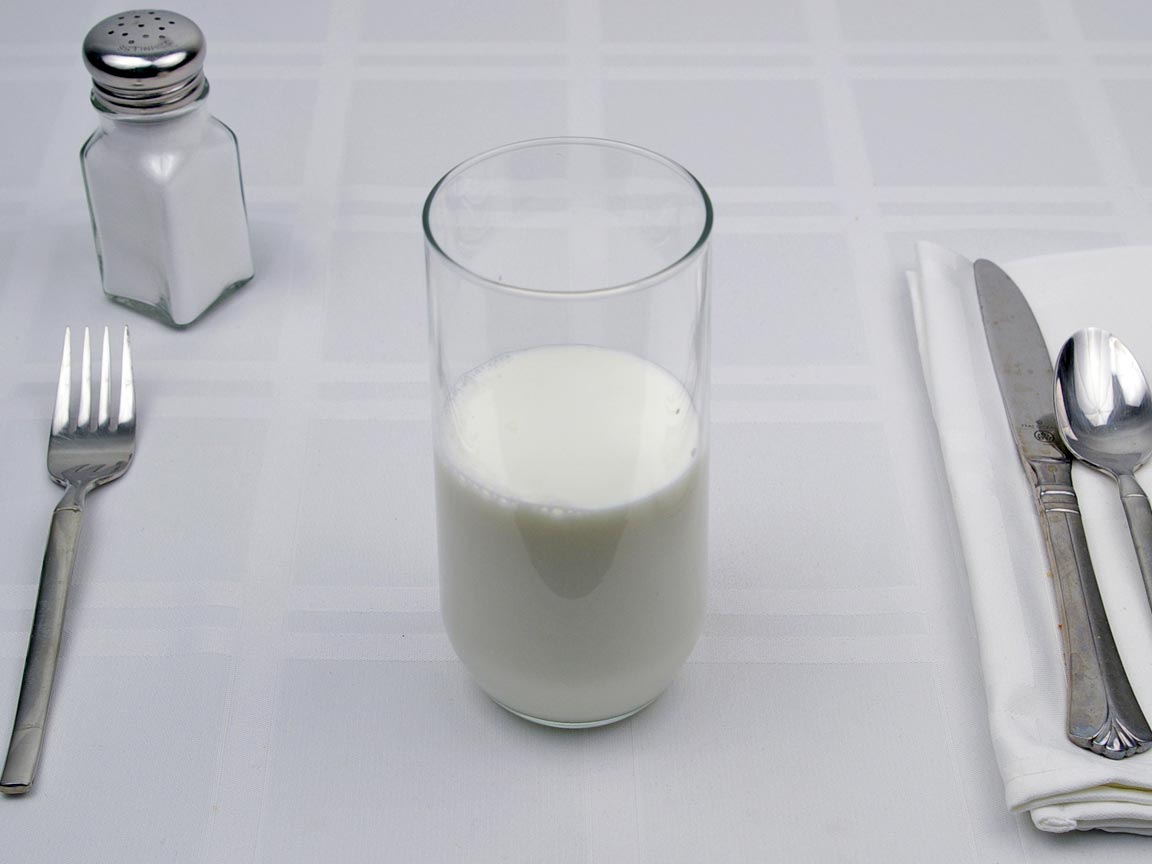 Calories in 9 fl oz(s) of Milk - Whole
