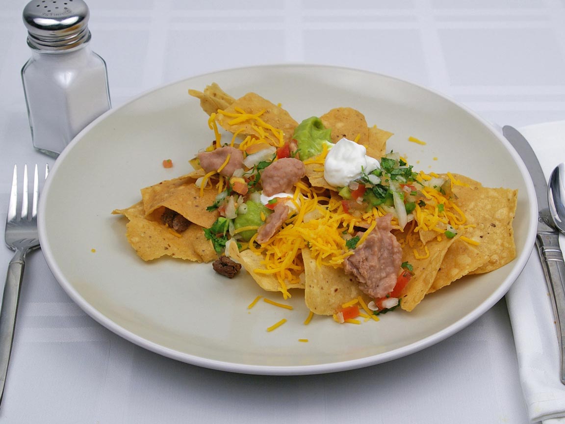 Calories in 85 grams of Nachos - Beef and Cheese