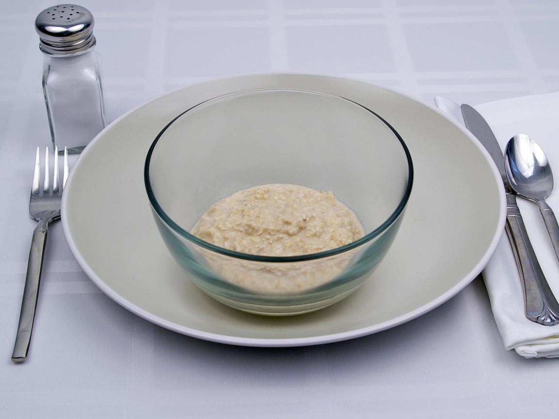 Calories in 0.5 cup(s) of Oatmeal - rolled oats - made with Water