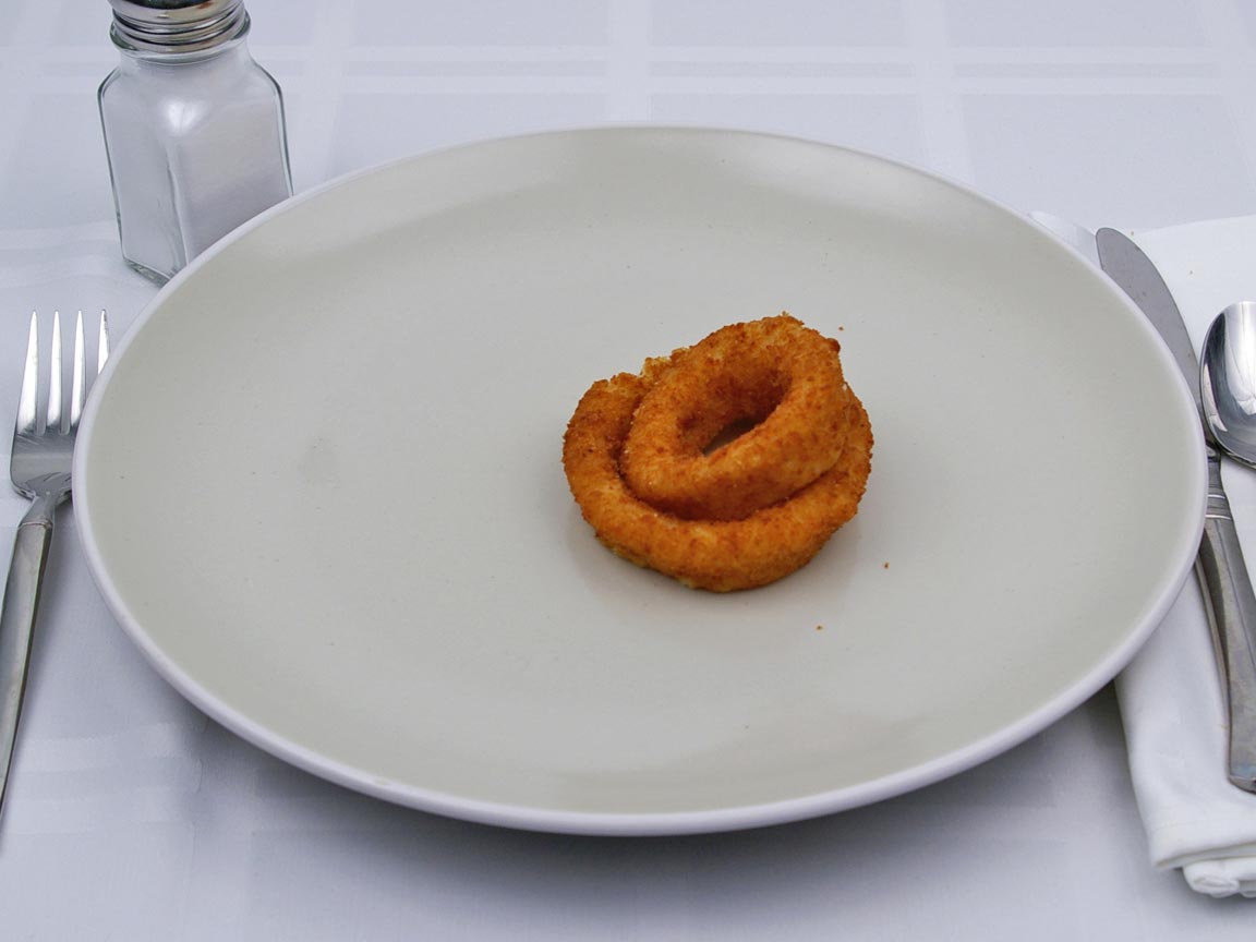 Calories in 28 grams of Onion Rings - Frozen - Oven Heated
