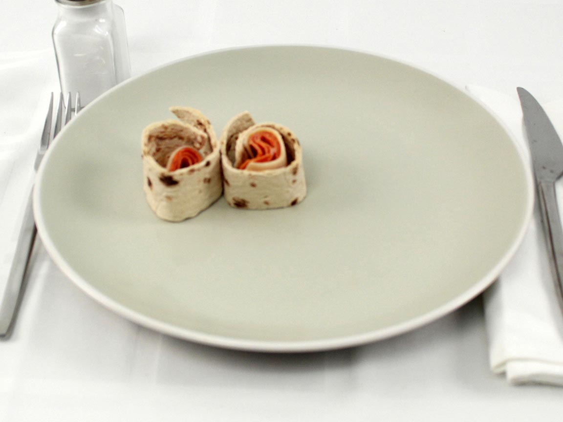 Calories in 0.5 wrap(s) of Pepperoni Pizza Wrap