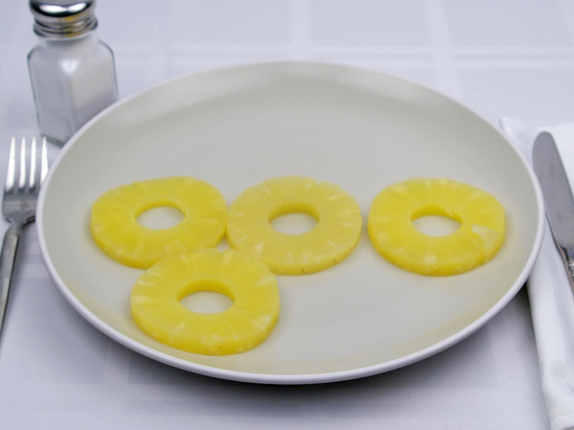 Calories in 4 slice(s) of Pineapple - Sliced - Canned - in Juice