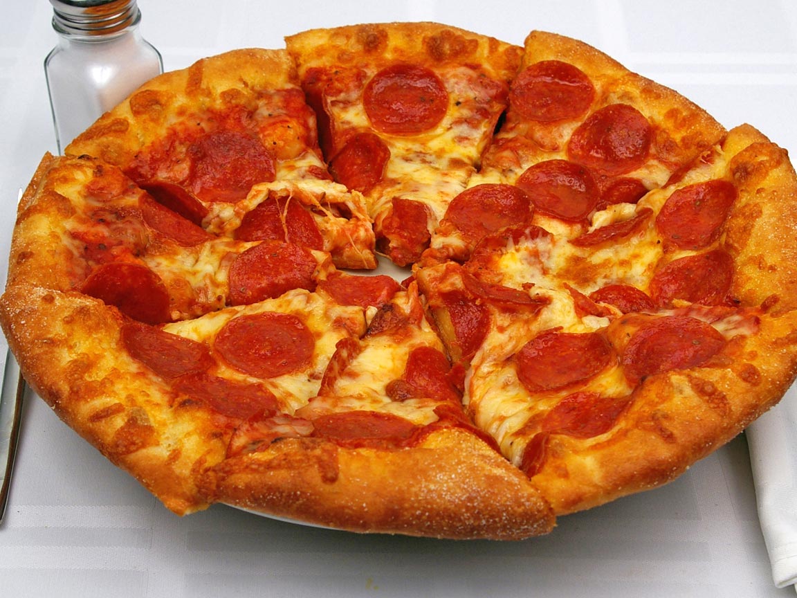 Calories in 8 slice(s) of Pizza - Pepperoni - Reg Crust - Medium - 12 inch