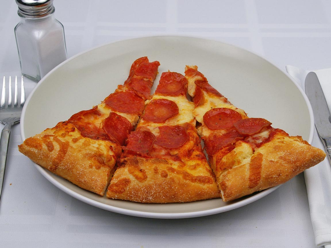 Calories in 1.5 slice(s) of Pizza - Pepperoni - Reg Crust - XLarge - 16 inch