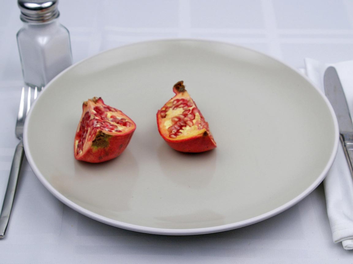 Calories in 0.5 pomegranate of Pomegranates