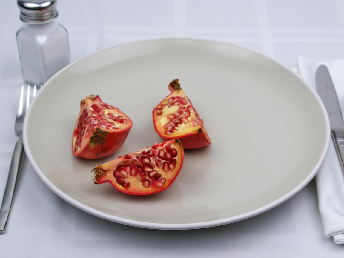Calories in 0.75 pomegranate of Pomegranates